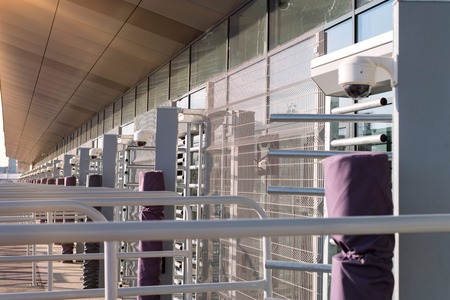 Security entrance gate - secured turnstiles before inspection at stadium