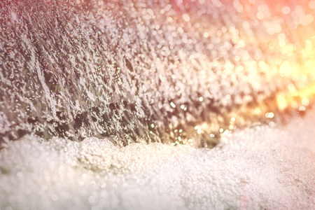 Clean warm water with foam. Spring of filtered water. Environmental useの写真素材