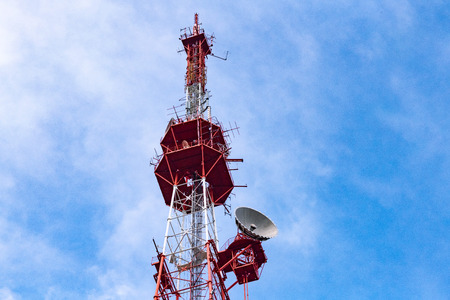 4G TV radio tower with parabolic antenna and satellite dish. Broadcast network signal. High coverage...