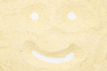 Semolina, funny smile face, close up, macro, top view. Popular flour in cooking. Used for making of pasta or couscous or as baby food.の写真素材