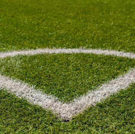 Texture of artificial grass herb cover sports field. It is used in different sports: football,...