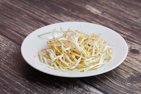 Bean sprouts of mung, maash. Traditional vegan dish in east Asia. Healthy diet food.の写真素材