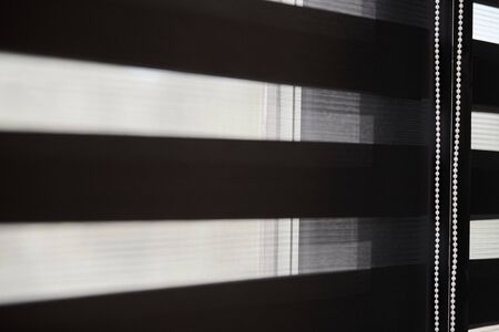 Office blinds. Modern fabric blinds. Office meeting room lighting range control.の写真素材