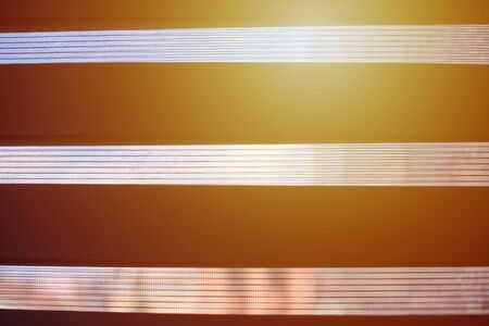 Office blinds. Sunlight through modern fabric blinds. Office meeting room lighting range control.