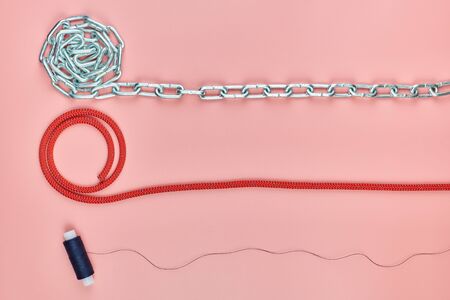 Chain, braided nylon rope and thread. Strength comparison concept. Durable mount selection