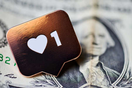 Like heart symbol on dollar. Like sign button, symbol with heart and one digit. Buy followers for social media network marketing. Cheap price concept.の写真素材