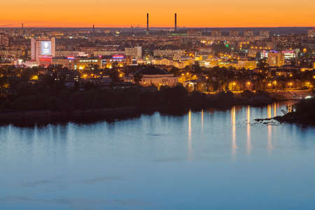 Nizhny Novgorod, Russia - 08.21.2020 - Nizhny Novgorod cityscape sunset. Beautiful scenic evening time over city skyline. Colorful sundown. Clear calm weather at duskのeditorial素材