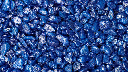 Blue gemstone fake pattern. Blue glitter stones for garden decoration, flat lay, top view...