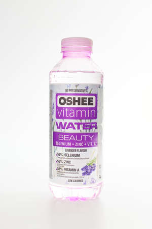 Kaliningrad, Russia - 09.11.2021 - Oshee vitamin water bottle isolated on white background, vitamin enriched sports drink for active peopleのeditorial素材