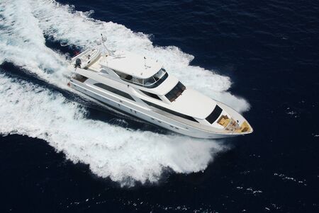 Luxury yacht aerial from helicopterの写真素材