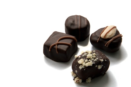 four chocolate candys isolated on white backgound