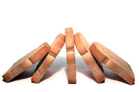 symmetric building of zwieback pieces isolated on whiteの写真素材