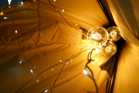 Decorate the tent with light bulbs