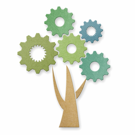 Environmentally friendly manufacturing and industry label. Tree with leaves in the form of gears from Recycle cardboard texture.の写真素材