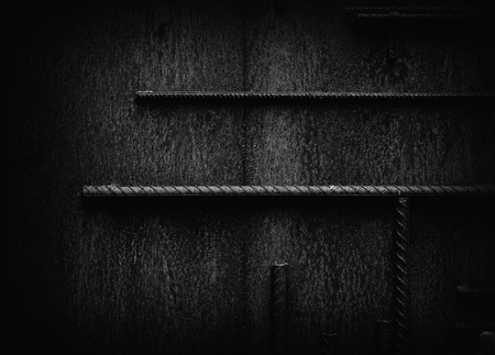 Grunge rust black metal background with steel bars.の写真素材