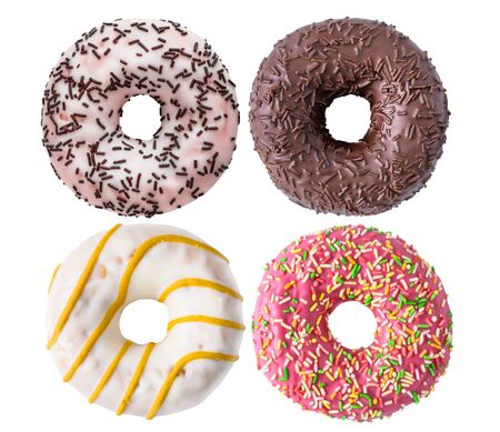 Assorted delicious donuts isolated on whiteの写真素材