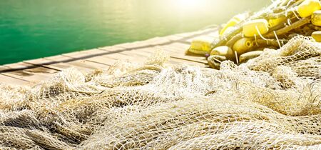 Fishing net on the pierの写真素材