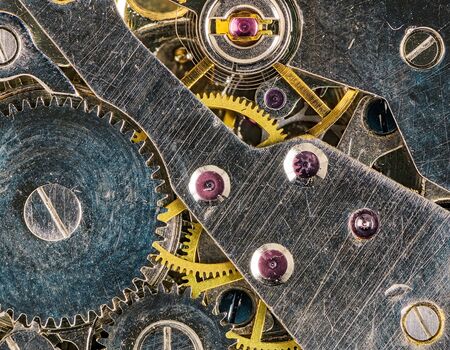 Clockwork background of old clock pocket Watch mechanism with Gears.の写真素材