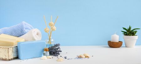 Natural aromatherapy and body care bath soap bars with towels banner or background.の写真素材