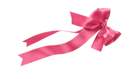 Pink ribbon with bow isolated on whiteの写真素材