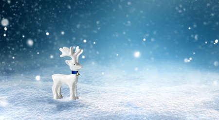 Christmas Deer in snowfall, Christmas background, banneの写真素材