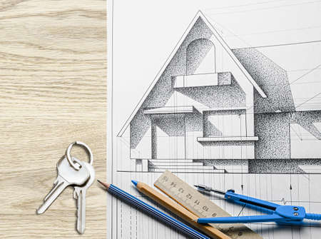 House keys on a house plan blueprint. New house design or home improvement concept.の写真素材