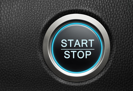 Engine Start Stop button on modern car. Black leather dashboard copy spaceの写真素材