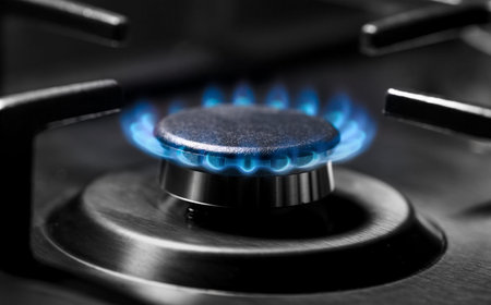 Gas burning in the burner of gas cooking surface