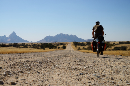 Long distance cycling at Spitzkoppe, Namibiaの写真素材