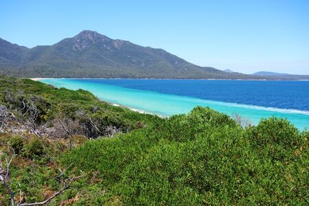 View over turquoise waters of Hazard Beach (next to Wineglass Bay), Freycinet National Park, Tasmania, Australiaの写真素材