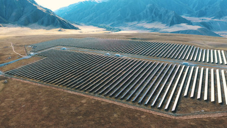 Aerial View Of Large Solar Panel Power Plant In Mountain