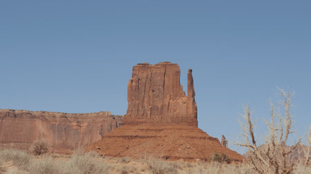 Rock Outcrop Monolith Butte Of Orange Red Color In Desert Of Monument Valley Usaの写真素材