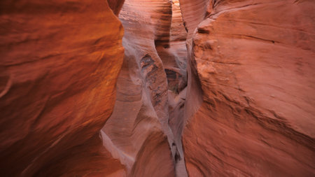 Motion In Mysterious Cave In Slot Canyon With Red Orange Smooth Rocks Formationの写真素材