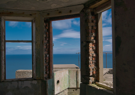 View from an old ruin to the open sea in Northern Irelandの写真素材
