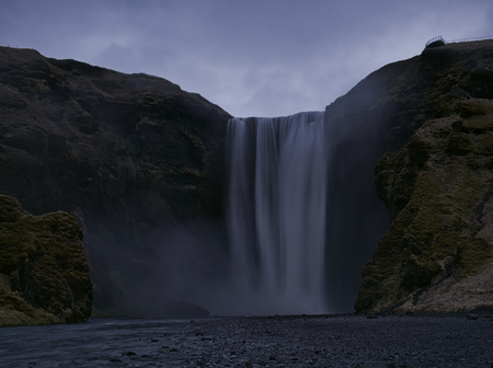 The Skogafoss waterfall in the south of Iceland at duskの写真素材