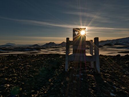 The sun shines through the hole in a chair. Photo from March in Iceland