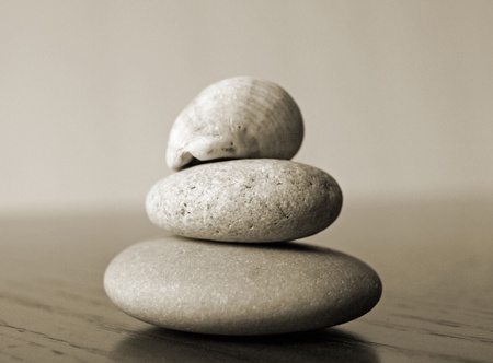 Rocks worn smooth by the ocean stacked togetherの写真素材
