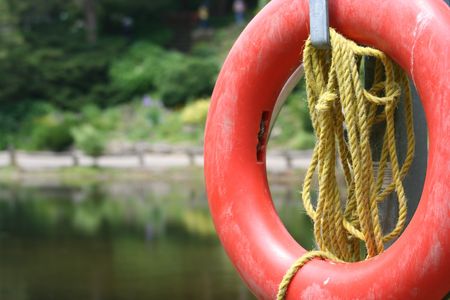 A lifebuoy near a pond