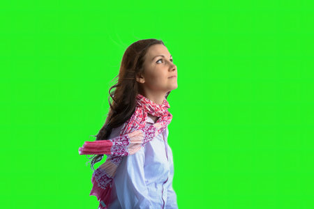 brown haired woman wiith scarf in green screenの写真素材