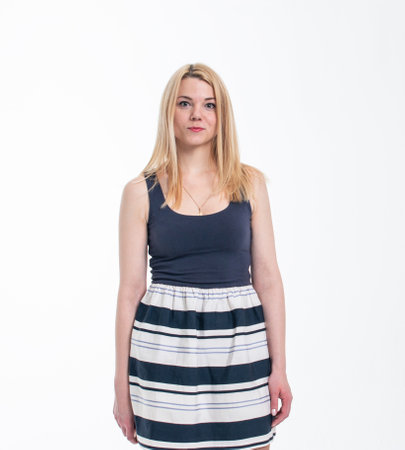 blond hair girl in a white studio backroundの写真素材