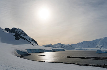 Antarctic landscape with icebergs, mountains and ocean in Antarcticaの写真素材