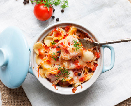 Casserole with pasta, tomato sauce and cheese, selective focusの写真素材