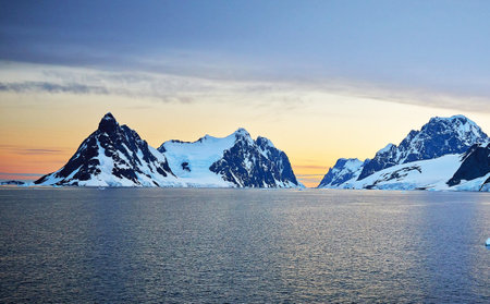 Antarctic landscape with icebergs at sunset, Antarctic Peninsula, Antarcticaの写真素材