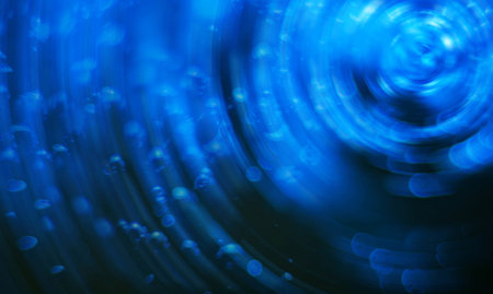 abstract blue background with bokeh defocused lights and shadowの写真素材