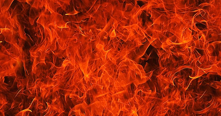 Fire flames on a black background. Abstract fire flames texture for backgroundの写真素材