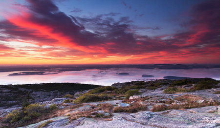 Sunrise over the sea of mist from the top of the mountainの写真素材