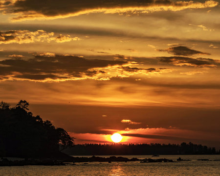 Beautiful sunset over the sea. Sunset on the coast of the sea.