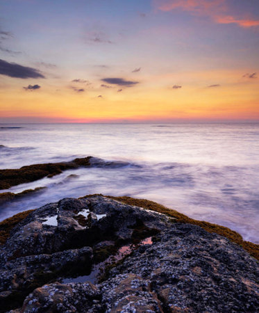 Sunset over the sea in Bali, Indonesia. Long exposureの写真素材