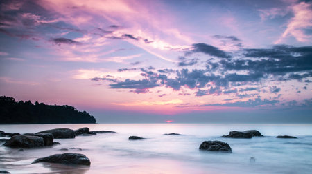 Beautiful sunset on the beach at Phuket, Thailand.の写真素材