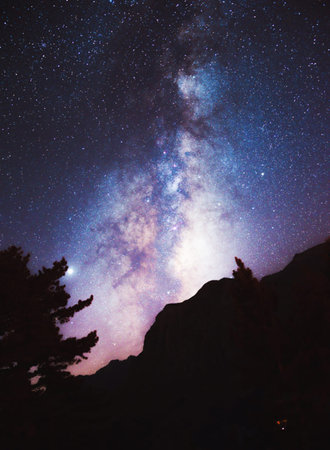 Milky Way over the mountain in Yosemite National Park, California, USAの写真素材